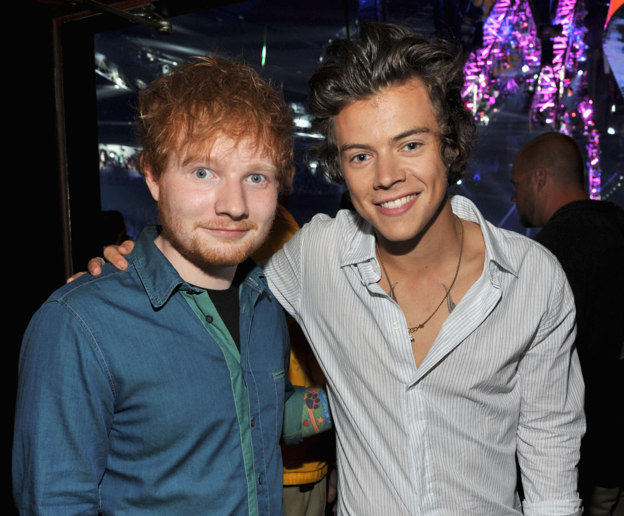 Musicians Ed Sheeran (L) and Harry Styles of One Direction attend the 2013 Teen Choice Awards at Gibson Amphitheatre on August 11, 2013 in Universal City, California. (Photo by Kevin Mazur/Fox/WireImage) 