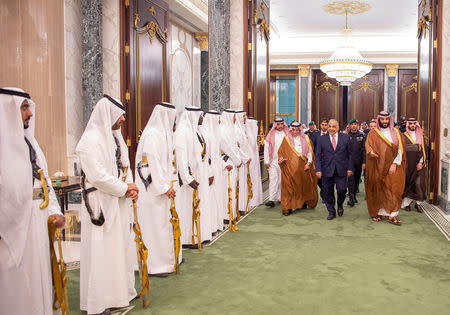 Saudi Arabia's Crown Prince Mohammed bin Salman walks with Iraq's Prime Minister Adel Abdul Mahdi in Riyadh, Saudi Arabia April 17, 2019. Picture taken April 17, 2019. Bandar Algaloud/Courtesy of Saudi Royal Court/Handout via REUTERS