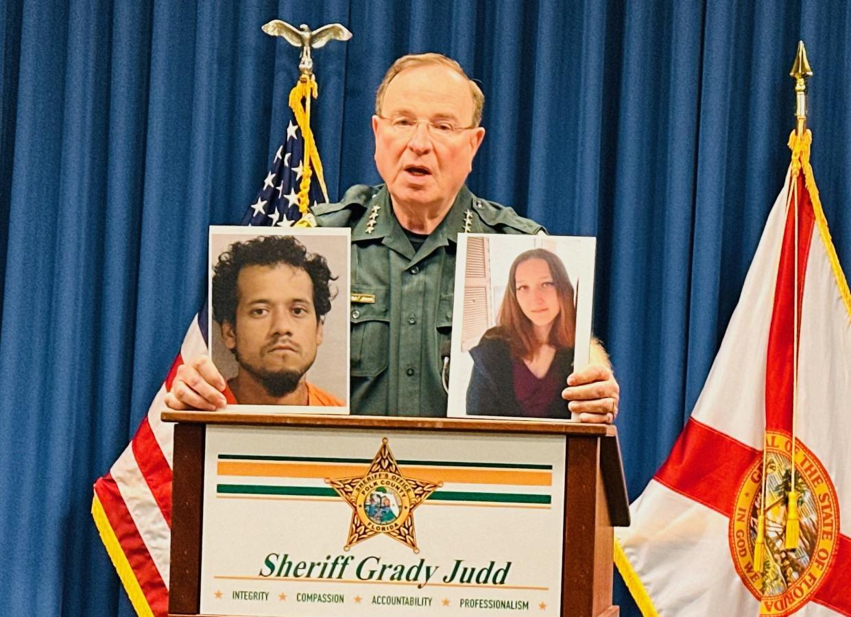 Polk County Sheriff Grady Judd holds up a photo of murder suspect Enrique Martinez, left, and victim Sierra Hernandez, right, during a news conference Monday afternoon. The Sheriff's Office confirmed Sierra Hernandez, 20, was found dead recently.