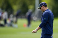Seattle Seahawks head coach Mike Macdonald walks on the field during the NFL football team's rookie minicamp Friday, May 3, 2024, in Renton, Wash. (AP Photo/Lindsey Wasson)