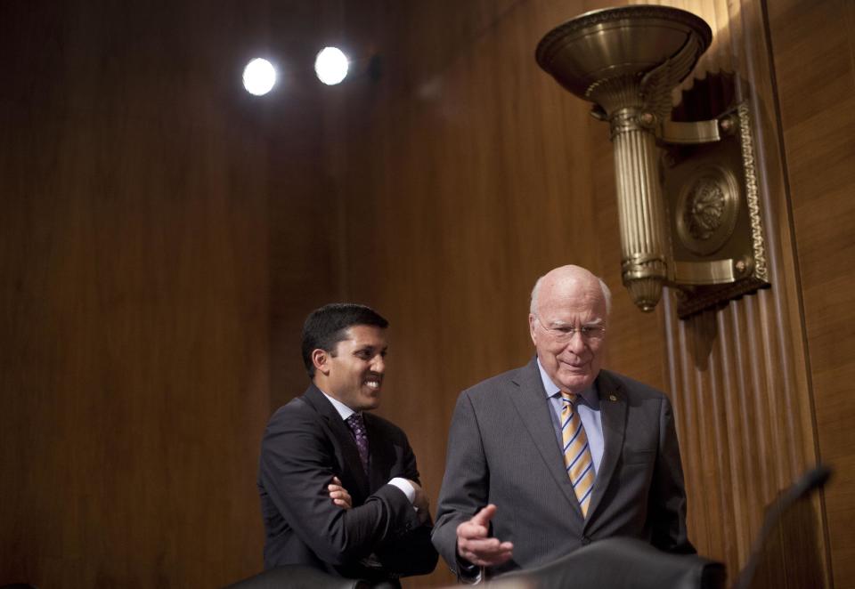 Senate subcommittee on State, Foreign Operations and Related Programs Chairman Sen. Patrick Leahy, D-VT., right, talks with US Agency for International Development (USAID) Administrator Dr. Rajiv Shah on Capitol Hill in Washington, Tuesday, April 8, 2014, following the committee's hearing of the USAID's fiscal 2015 budget. Leahy demanded to know who came up with the idea to launch a secret "Cuba Twitter" social network system. Speaking at the subcommittee hearing, Leahy called the project "cockamamie." (AP Photo/Pablo Martinez Monsivais)