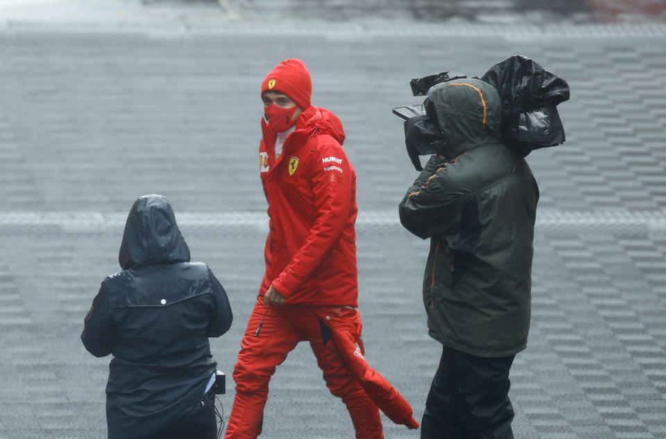 Ferrari driver Charles Leclerc of Monaco walks at the paddock during the second practice session for the Eifel Formula One Grand Prix at the Nuerburgring racetrack in Nuerburg, Germany, Friday, Oct. 9, 2020. The Germany F1 Grand Prix will be held on Sunday. (Ronald Wittek, Pool via AP)