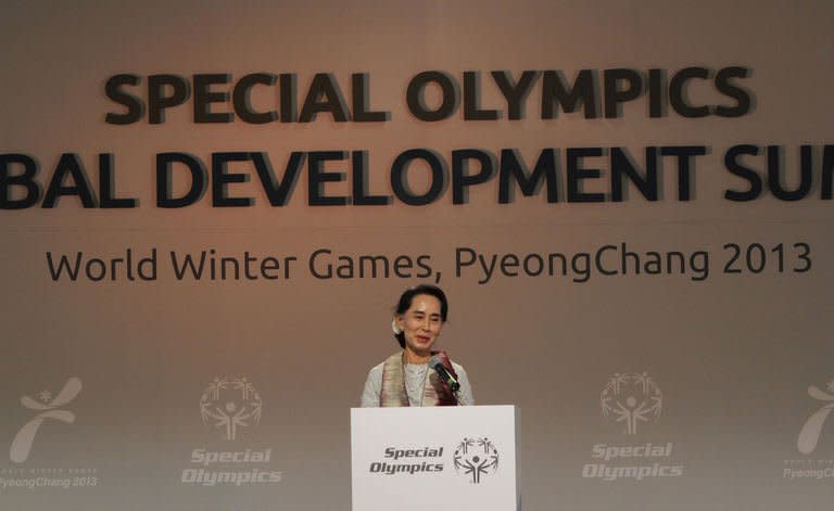 Myanmar's opposition leader, Aung San Suu Kyi talks to the media at The Global Development Summit, held on the sidelines of the 10th Special Olympics World Winter Games in Pyeongchang, on January 30, 2013. The democracy leader and Nobel peace laureate was a guest of honour at the opening of the Special Winter Olympics in the northeastern mountain resort of Pyeongchang