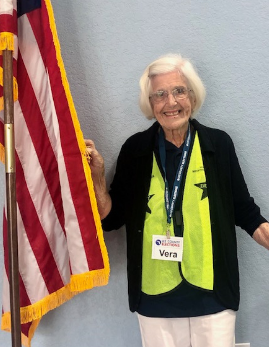 Poll worker Vera Craig poses for a photo on election day in March 2020.
