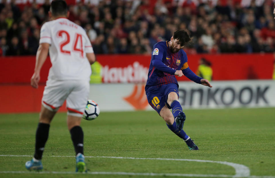 Soccer Football – La Liga Santander – Sevilla vs Barcelona – Ramon Sanchez Pizjuan, Seville, Spain – March 31, 2018 Barcelona’s Lionel Messi scores their second goal REUTERS/Jon Nazca