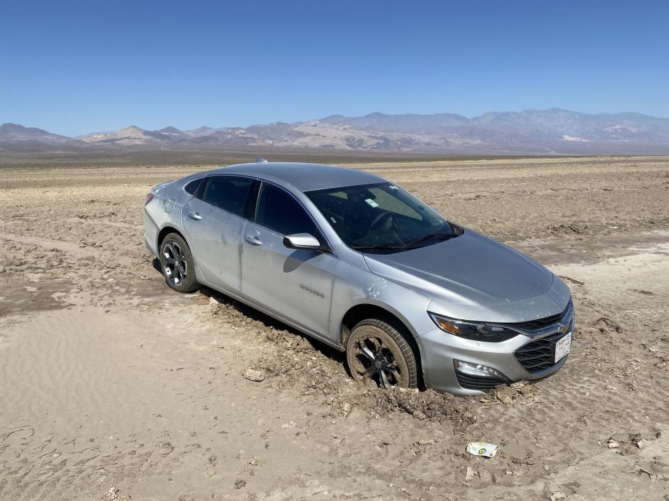 A car stuck in the mud in Death Valley National Park. / Credit: National Park Service