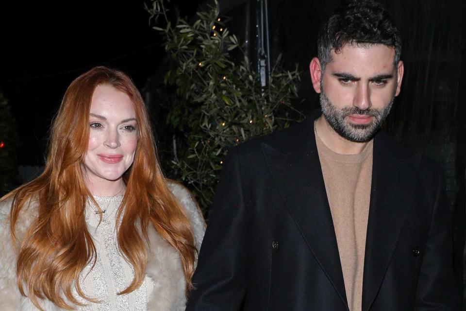 <p>Perception/Bauer-Griffin/GC Images</p> Lindsay Lohan and Bader Shammas step out in California on March 16, 2024