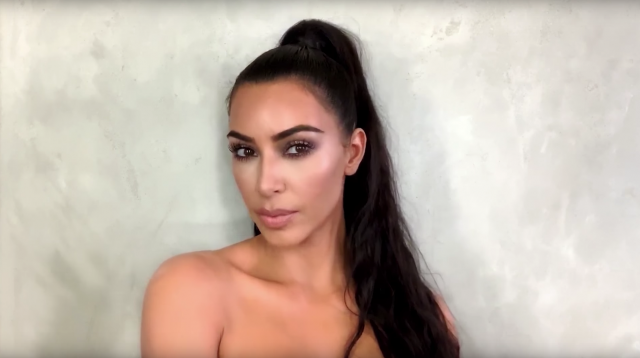 Watch the 'KUWTK' star create a gorgeous, smokey holiday makeup look on herself in the bathroom.