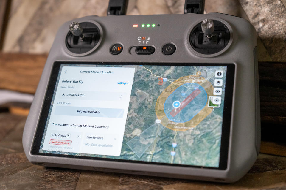 drone controller with location map to help adhere to local drone laws or drone regulations 