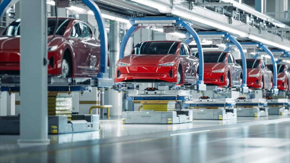 Electric cars on an assembly line