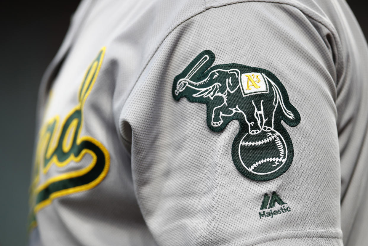 An Oakland Athletics logo is seen on Khris Davis' uniform sleeve before a baseball game against the Baltimore Orioles, Thursday, Sept. 13, 2018, in Baltimore. (AP Photo/Patrick Semansky)