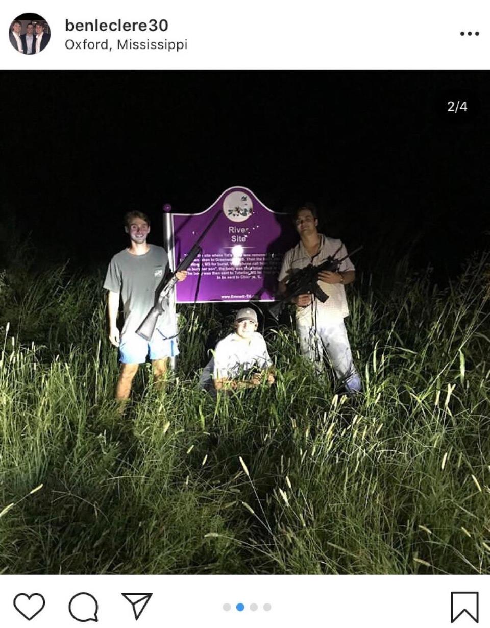 In this Instagram photo, three Ole Miss students posed smiling and toting guns in front of this bullet-riddled Emmett Till memorial sign in Tallahatchie County. Their fraternity has suspended them, and federal authorities are examining the incident.
