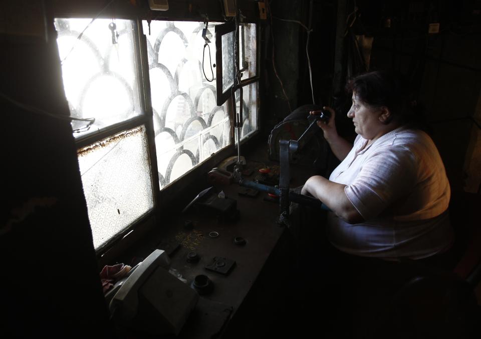 Kobiashvili operates 60-year-old cable cars from her booth in the town of Chiatura