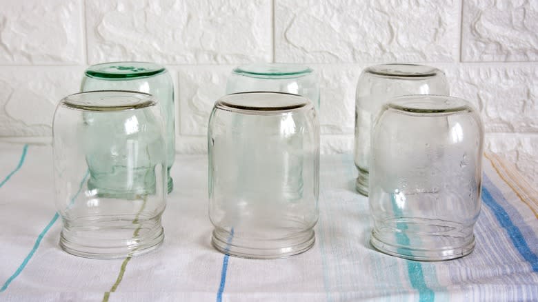 a variety of cleaned glass jars