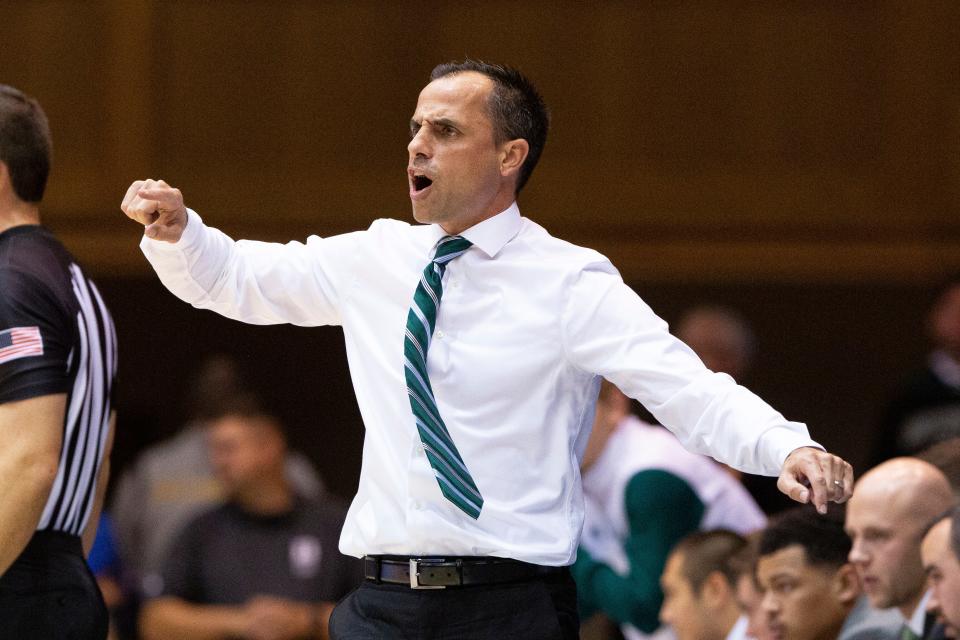 Northwest Missouri State head coach Ben McCollum shouts to his team during an NCAA college basketball game against Duke in Durham, N.C., Saturday, Oct. 26, 2019.