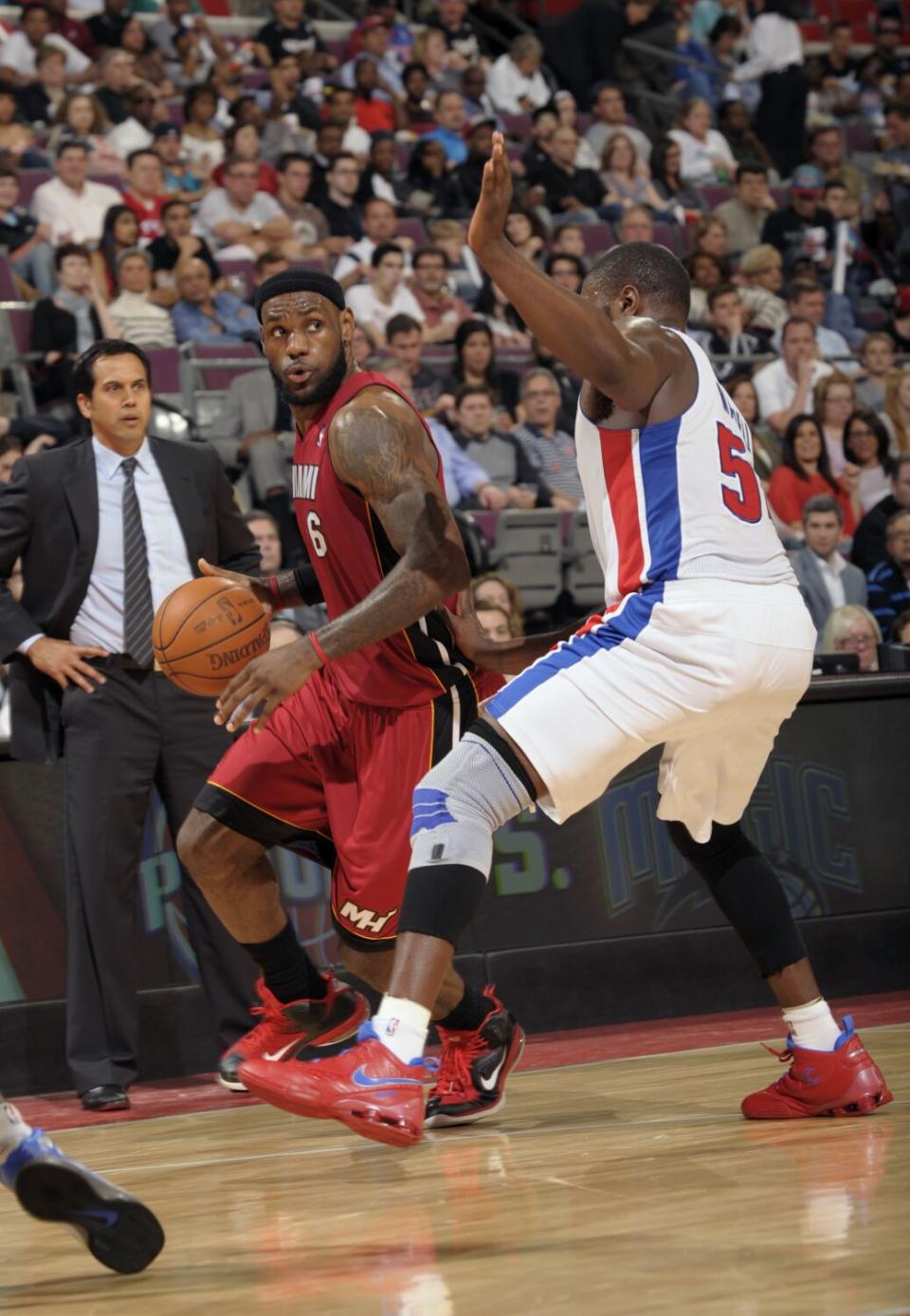 LeBron James looks to drive against Detroit's Jason Maxiell on March 23, 2012, at The Palace in Auburn Hills, Mich.