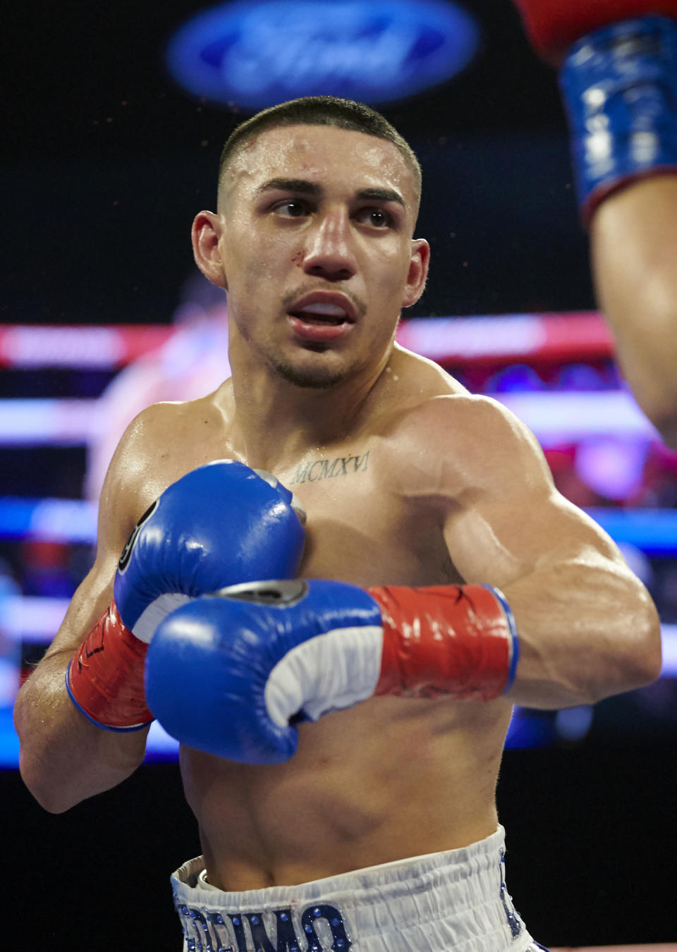 FILE - In this Feb. 2, 2019, file photo, Teofimo Lopez is shown during his lightweight boxing match against Diego Magdaleno, in Frisco, Texas. Brooklyn-born Teofimo Lopez stunned Vasiliy Lomachenko on Saturday, Oct. 17, 2020, to win a unanimous 12-round decision and unify the lightweight titles to join a rare group of boxers of Central American descent to capture a world championship. (AP Photo/Cooper Neill, File)