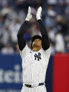 New York Yankees' Juan Soto reacts after hitting a double against the Miami Marlins during the third inning of a baseball game, Monday, April 8, 2024, in New York. (AP Photo/Noah K. Murray)