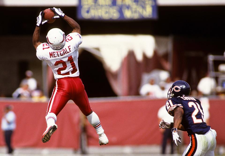 Arizona Cardinals running back and kick returner Eric Metcalf snags a pass during a 1998 game against the Chicago Bears. Metcalf played 12 seasons in the NFL, six of them with the Cleveland Browns. He's the only player in league history with more than 7,000 yards from scrimmage and 7,000 return yards.