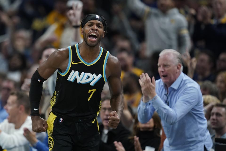 Indiana Pacers' Buddy Hield (7) reacts after hitting a shot during the second half of an NBA basketball game against the Milwaukee Bucks, Thursday, Nov. 9, 2023, in Indianapolis. (AP Photo/Darron Cummings)