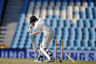 Cricket - New Zealand v South Africa - second cricket test match - Centurion Park, Centurion, South Africa - 30/8/2016. New Zealand's Mitchell Santner is bowled out by South Africa's Dale Steyn. REUTERS/Siphiwe Sibeko