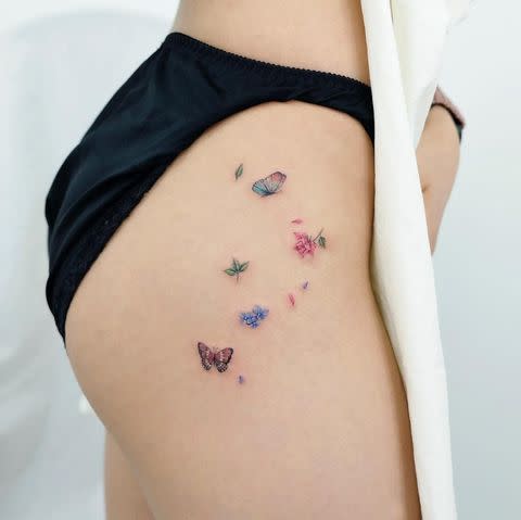 9) A Cluster of Butterfly Tattoos