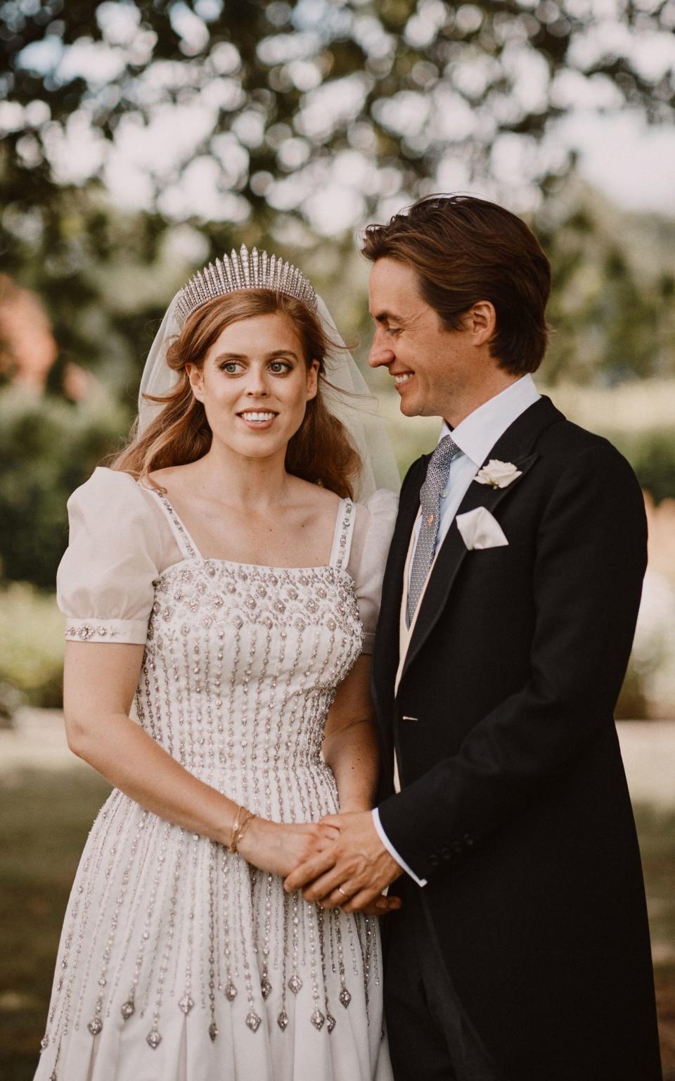 Princess Beatrice and Edoardo Mapelli Mozzi in the grounds of the Royal Lodge, after their wedding - Benjamin Wheeler/PA