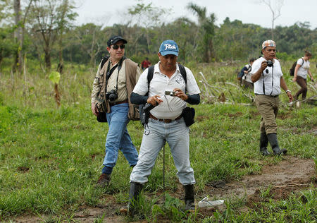 FILE PHOTO: Environmental officials inspect Isla Portillos, a 16-square-km swath of Caribbean wetland at the center of a dispute between Costa Rica and Nicaragua April 5, 2011. REUTERS/Juan Carlos Ulate/File Photo