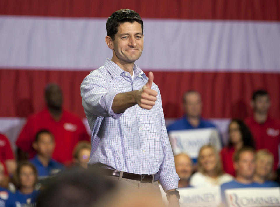 Republican vice presidential candidate Rep. Paul Ryan, R-Wis., gives a thumbs-up at a rally Sunday, August 12, 2012, in Mooresville, N.C., at the NASCAR Technical Institute. (AP Photo/Jason E. Miczek)