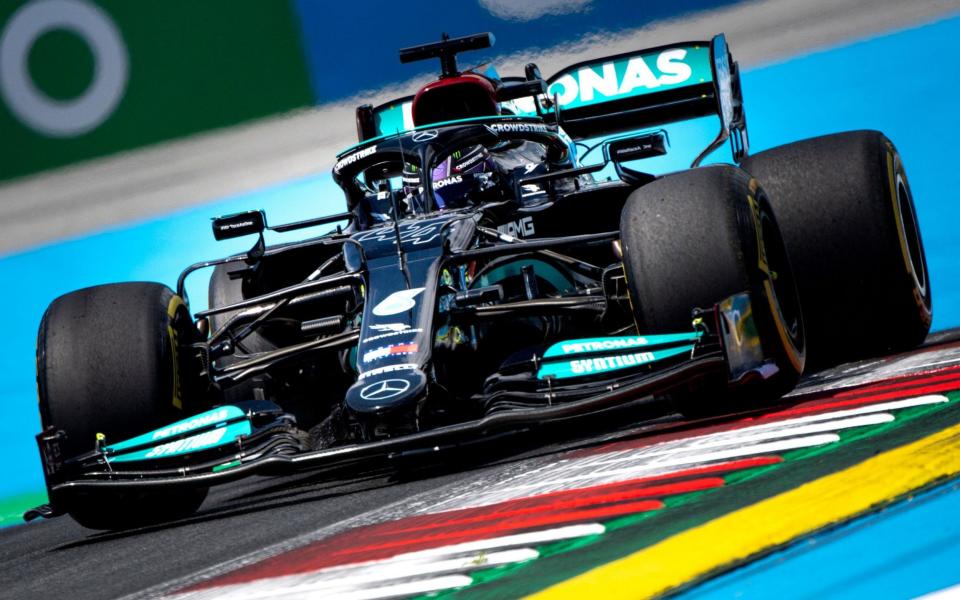 Mercedes' British driver Lewis Hamilton drives during the first practice session at the Red Bull Ring race track in Spielberg, Austria, on June 25, 2021, ahead of the Formula One Styrian Grand Prix -  JOE KLAMAR/AFP via Getty Images