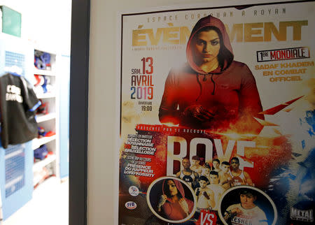 A poster announces the official boxing bout of Iranian boxer Sadaf Khadem in Royan, France, April 11, 2019. REUTERS/Regis Duvignau