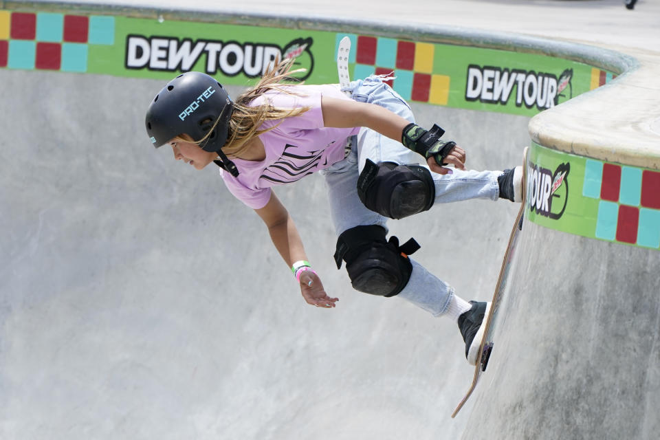 FILE - In this May 23, 2021, file photo, Sky Brown, of Great Britain, competes in the women's Park Final during an Olympic qualifying skateboard event at Lauridsen Skatepark, in Des Moines, Iowa. Skating is one of four debut Olympic sports, along with karate, surfing and sport climbing. (AP Photo/Charlie Neibergall, File)