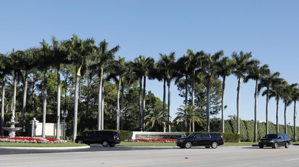 The motorcade carrying President Donald Trump arrives at Trump International Golf Club, Sunday, Feb. 2, 2020, in West Palm Beach, Fla. (AP Photo/Terry Renna)