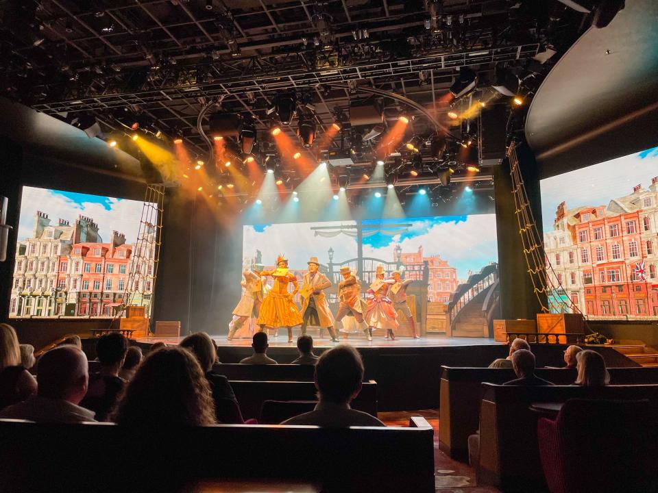 performers on stage at Regent Seven Seas Cruises Grandeur's 
 theater