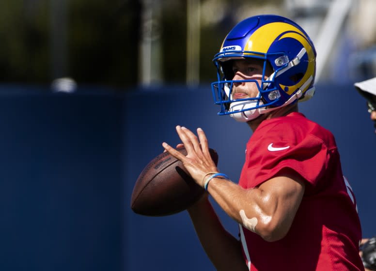 IRVINE, CA - JULY 28, 2021: Rams starting quarterback Matthew Stafford looks to pass on the first day of training camp at UC Irvine on July 28, 2021 in Irvine, California.(Gina Ferazzi / Los Angeles Times)