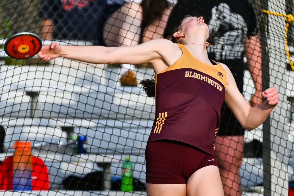Bloomington North’s Ashley Greer competes in the girls' discus during the Conference Indiana track meet at Bloomington North on Friday, April 26, 2024.