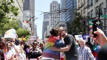 <p>The then-presidential hopeful and Emhoff attended San Francisco's Pride parade in June 2019. In addition to <a href="https://twitter.com/KamalaHarris/status/1145506661152542720" rel="nofollow noopener" target="_blank" data-ylk="slk:dancing at the event;elm:context_link;itc:0;sec:content-canvas" class="link ">dancing at the event</a>, the pair also shared a kiss.</p> <p>Harris wore a rainbow-colored sequined jacket, and Emhoff sported a black T-shirt with her name across the front.</p>