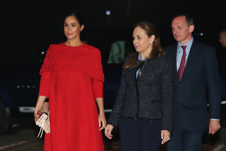 Britain's Meghan, Duchess of Sussex, is welcomed by British Ambassador to Morocco Thomas Reilly and his wife Alix at the Casablanca Airport in Casablanca, Morocco, February 23, 2019. REUTERS/Hannah McKay/Pool