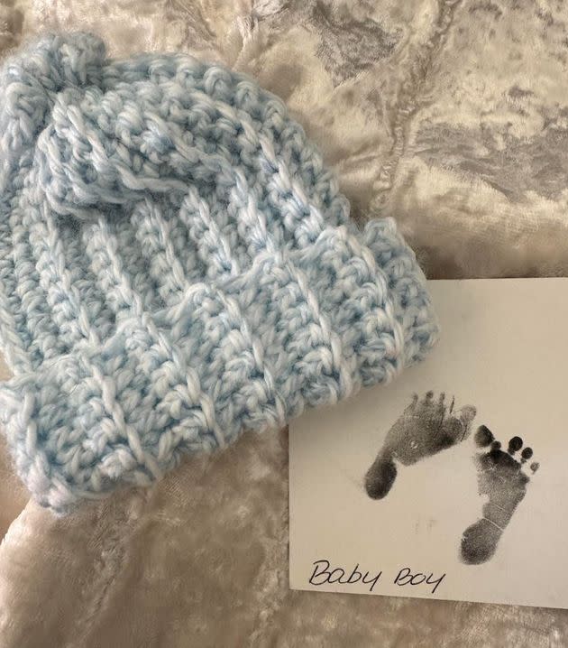 "This is Benjamin's baby hat and footprints from the hospital," the author writes. "After I refused photos with him, one of my nurses called the nonprofit, Now I Lay Me Down to Sleep, and a photographer volunteer came to take pictures of him. The nurse also put together a memorial box with his hat, footprints, and the baby blanket he was wrapped in. I am forever grateful for their kindness." <span class="copyright">Courtesy of Alana Sheeren</span>