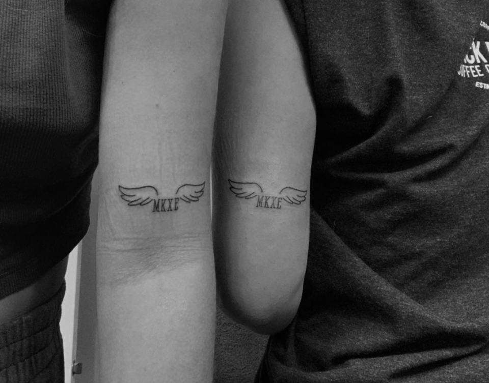 The survivor posted a picture of her ink featuring angel wings and the victims’ initials — MKXE — on VSCO (VSCO)