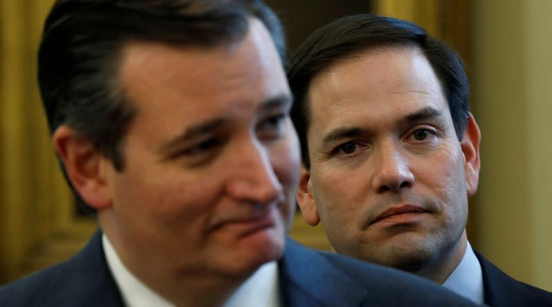 FILE PHOTO: Cruz and Rubio at NASA transition authorization act signing ceremony at the White House in Washington