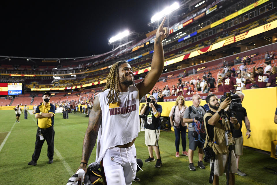 Washington Football Team defensive end Chase Young (99) celebrates after a preseason NFL football game against the Cincinnati Bengals, Friday, Aug. 20, 2021, in Landover, Md. (AP Photo/Nick Wass)