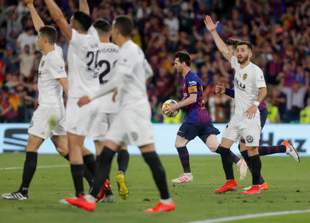 Soccer Football - Copa del Rey - Final - FC Barcelona v Valencia - Estadio Benito Villamarin, Seville, Spain - May 25, 2019 Barcelona's Lionel Messi celebrates scoring their first goal REUTERS/Jon Nazca