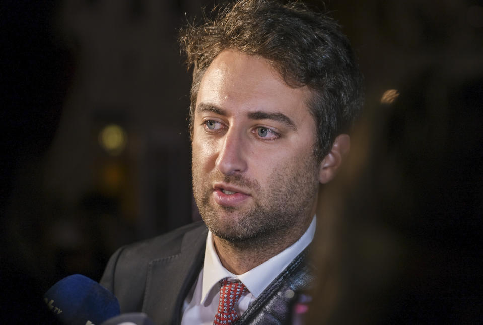 Matthew Caruana Galizia, son of slain journalist Daphne Caruana Galizia, speaks to media outside the Valletta Law court, Friday, Oct. 14, 2022. In a stunning reversal, the two brothers who are on trial for the car-bomb murder of the Maltese anti-corruption journalist entered guilty pleas on the first day of trial. (AP Photo/Jonathan Borg)