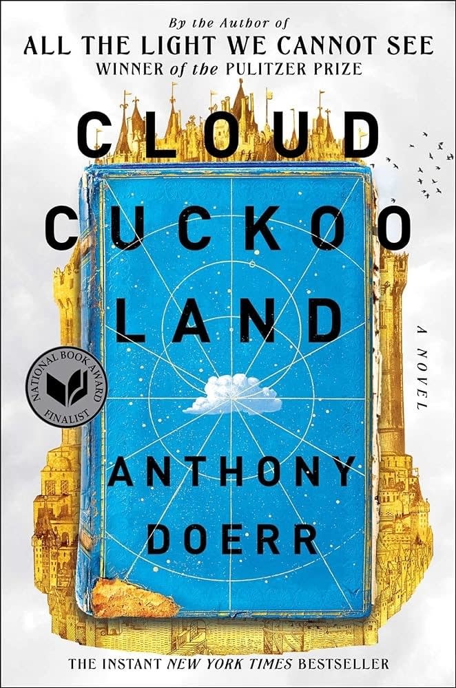 Cover of "Cloud Cuckoo Land" by Anthony Doerr featuring a book illustration with a cityscape and a bird flying overhead