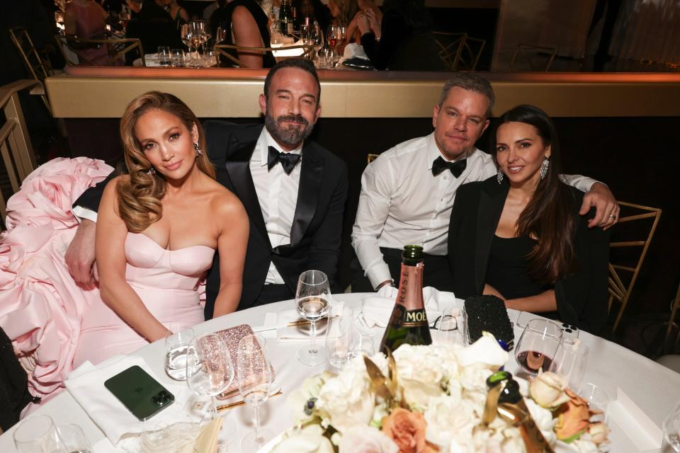 Jennifer Lopez, Ben Affleck, Matt Damon and Luciana Barroso hang out at the 81st Annual Golden Globe Awards, Jan. 7, 2024, at the Beverly Hilton.