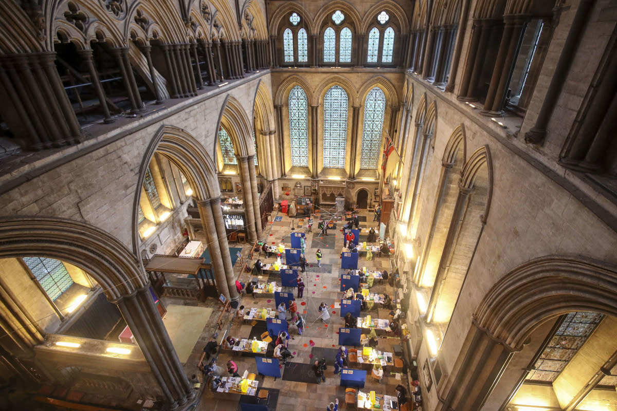 <p>Vaccinations being administered at Salisbury Cathedral in Wiltshire</p> (PA)