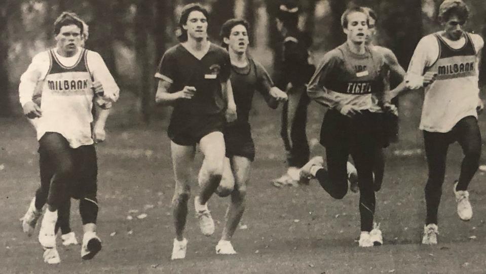 Brent Wherry (left) and teammate Scott Lewno of Milbank run during a high school cross country meet in Watertown in the mid-1980s.