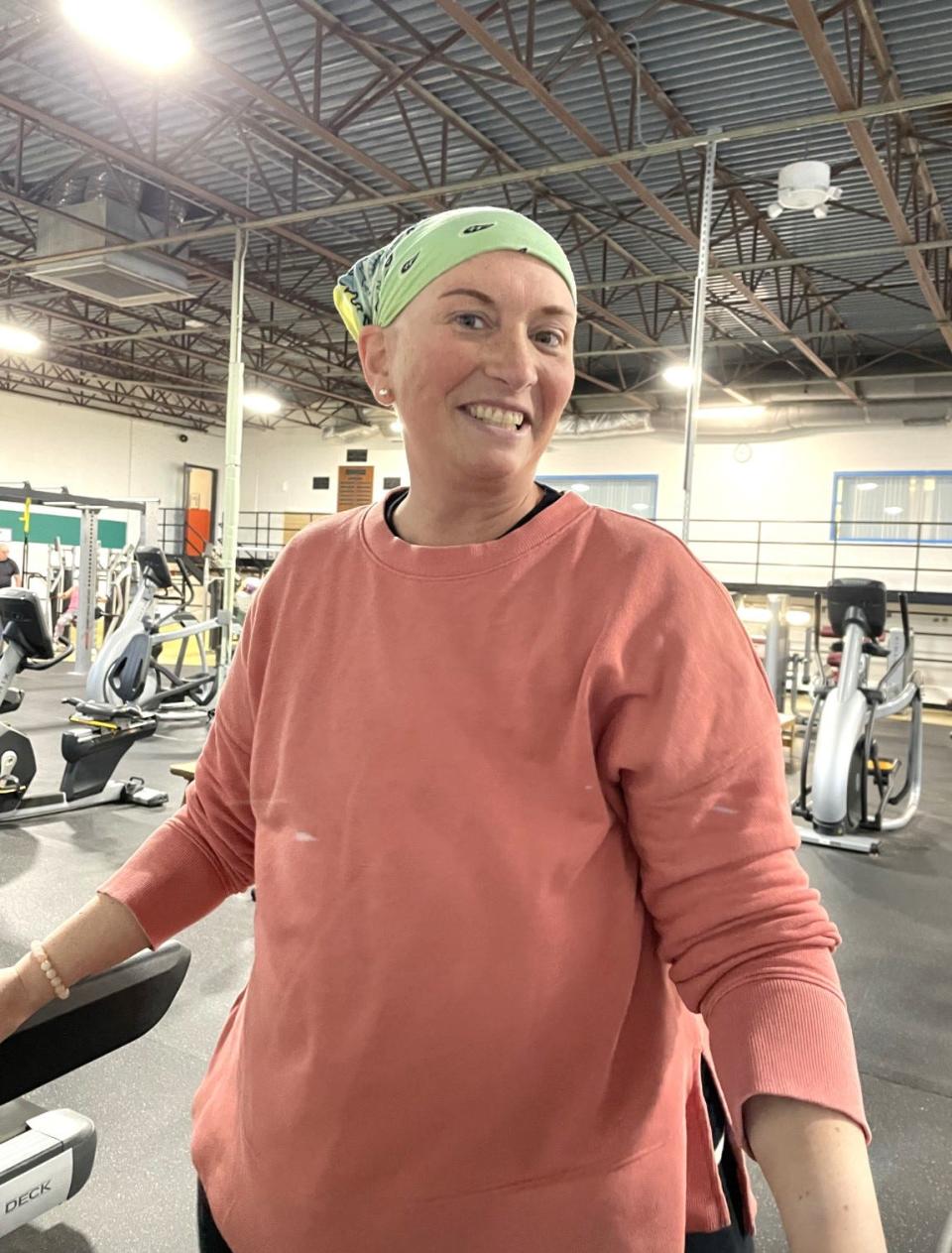 Cancer survivor Casey Villata works out on a treadmill during an Old Colony YMCA Livestrong session.