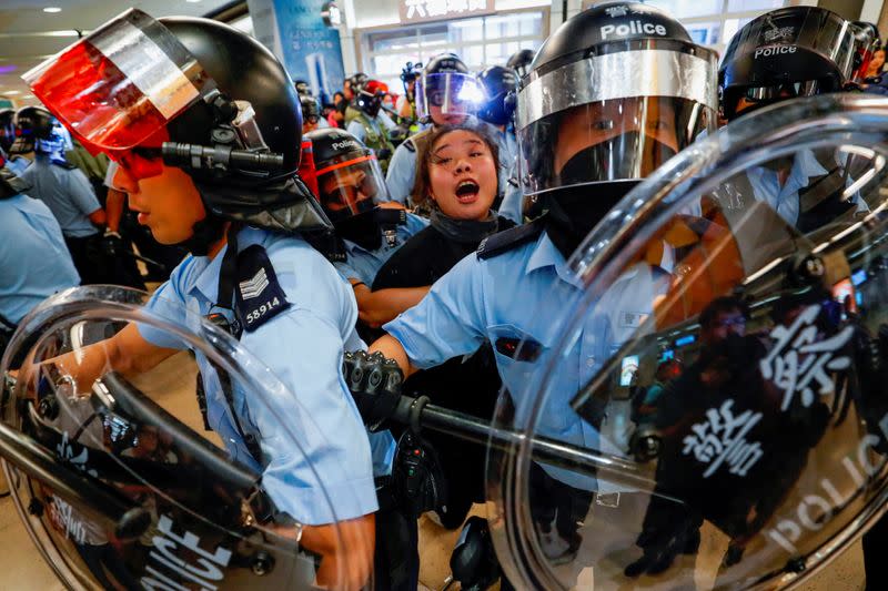 Pictures of the Year: Hong Kong protest tide turns into sea of flames